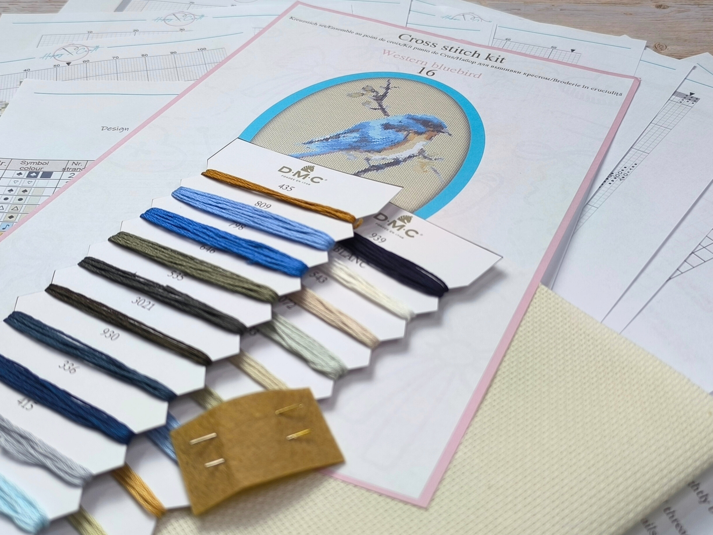 Western bluebird cross stitch kit including DMC floss, printed chart, fabric, and needles