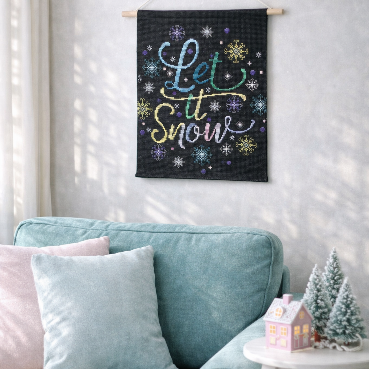 Counted Cross Stitch Kit Let It Snow – Christmas Snowflake Quote Embroidery Kit displayed as wall hanging decor