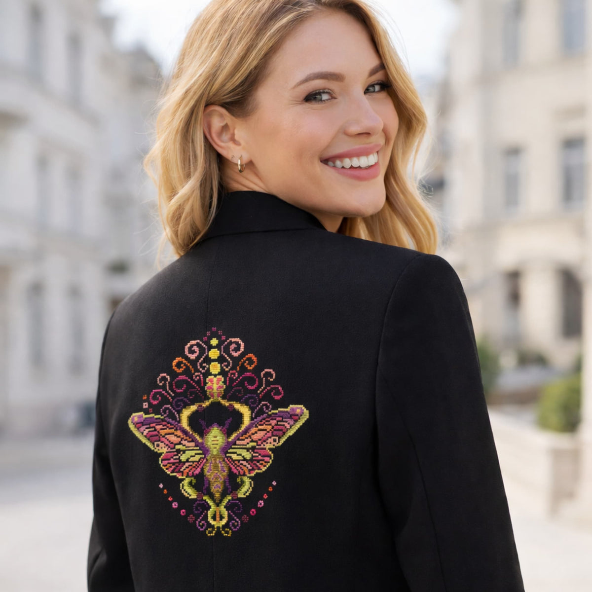 Cross Stitch Pattern Colorful Purple Moth PDF – Folk Ornament Moth Embroidery Design stitched on back of black jacket