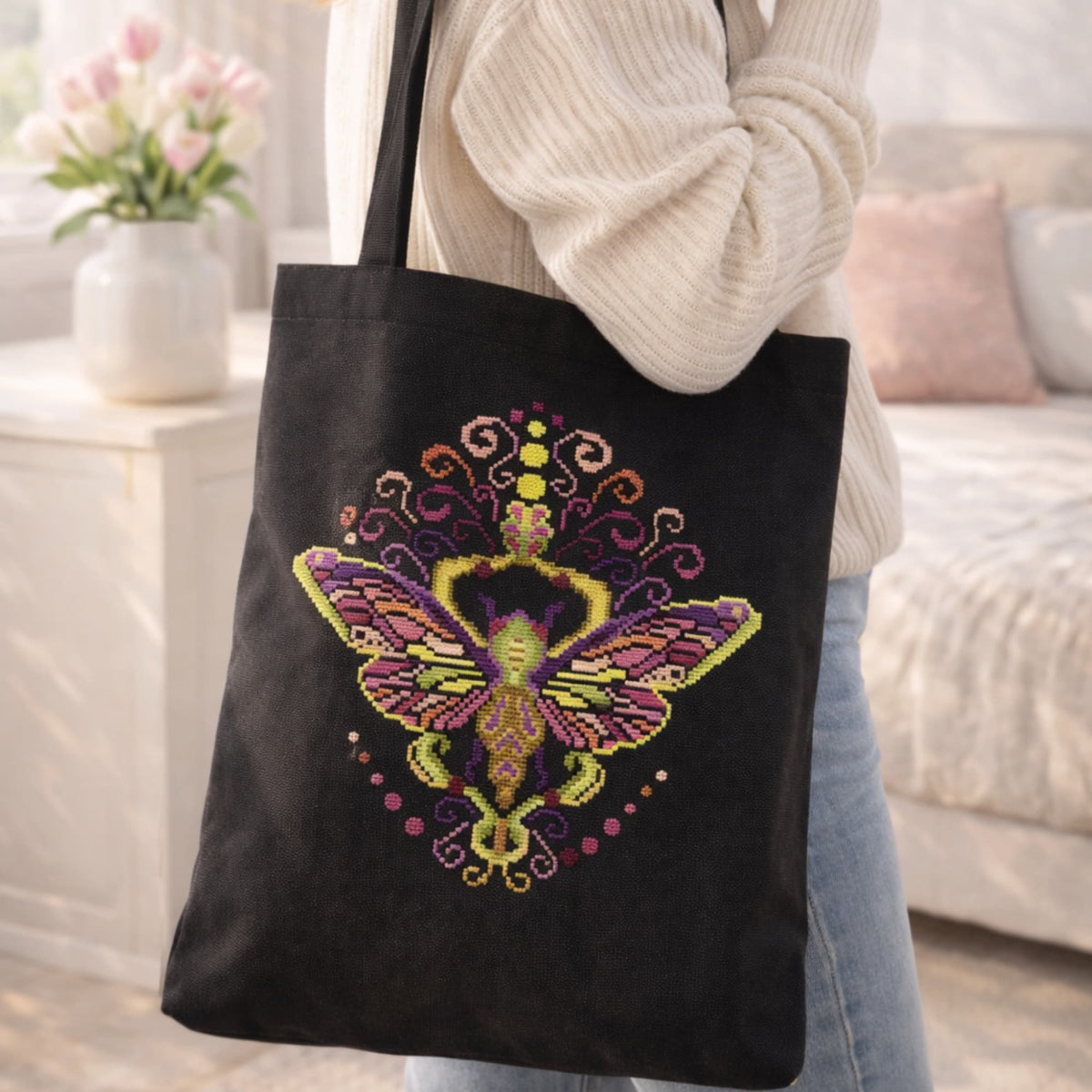 Cross Stitch Pattern Colorful Purple Moth PDF – Folk Ornament Moth Embroidery Design stitched on black canvas tote bag