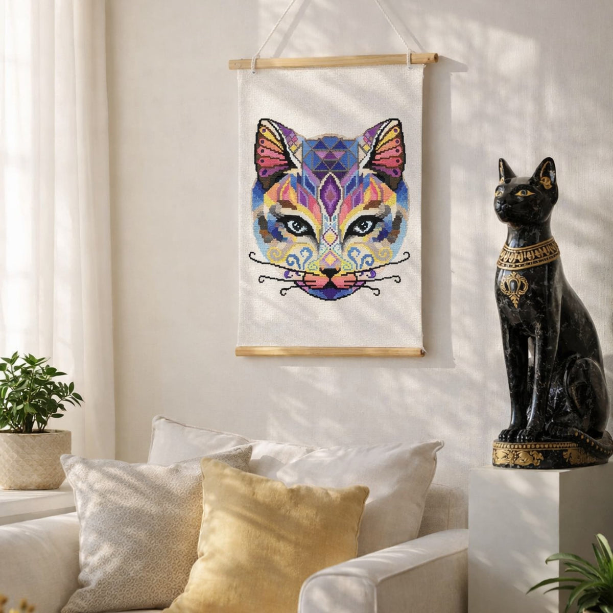 Egyptian cat cross stitch kit displayed as decorative wall hanging embroidery, colorful modern cat DIY project