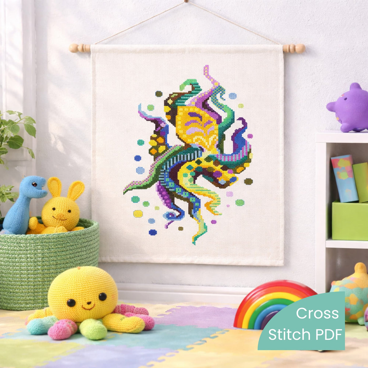 Modern octopus cross stitch pattern PDF displayed as wall hanging in kids room with playful ocean theme embroidery.