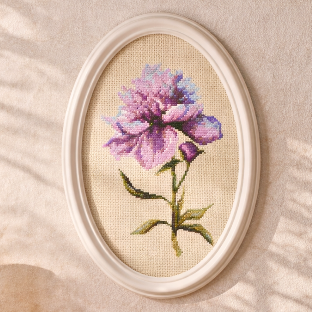 Oval wall frame with pink peony cross stitch embroidery, romantic floral wall decor in soft pastel tones