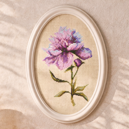 Oval wall frame with pink peony cross stitch embroidery, romantic floral wall decor in soft pastel tones