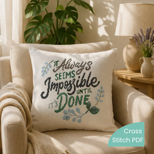 Quote cross stitch pattern PDF displayed on decorative pillow with motivational embroidery text design.