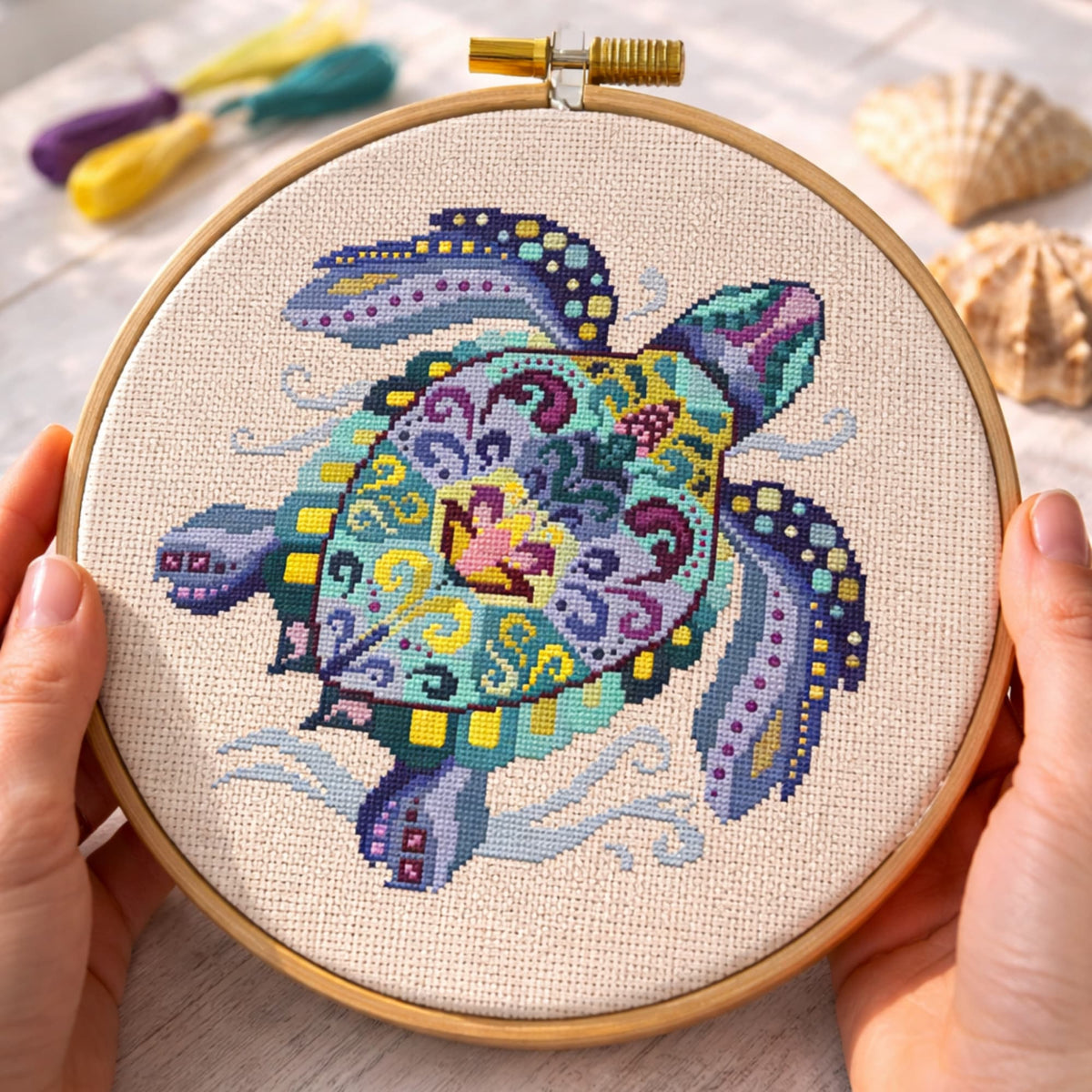 Sea turtle cross stitch kit in wooden hoop including fabric, floss and instructions