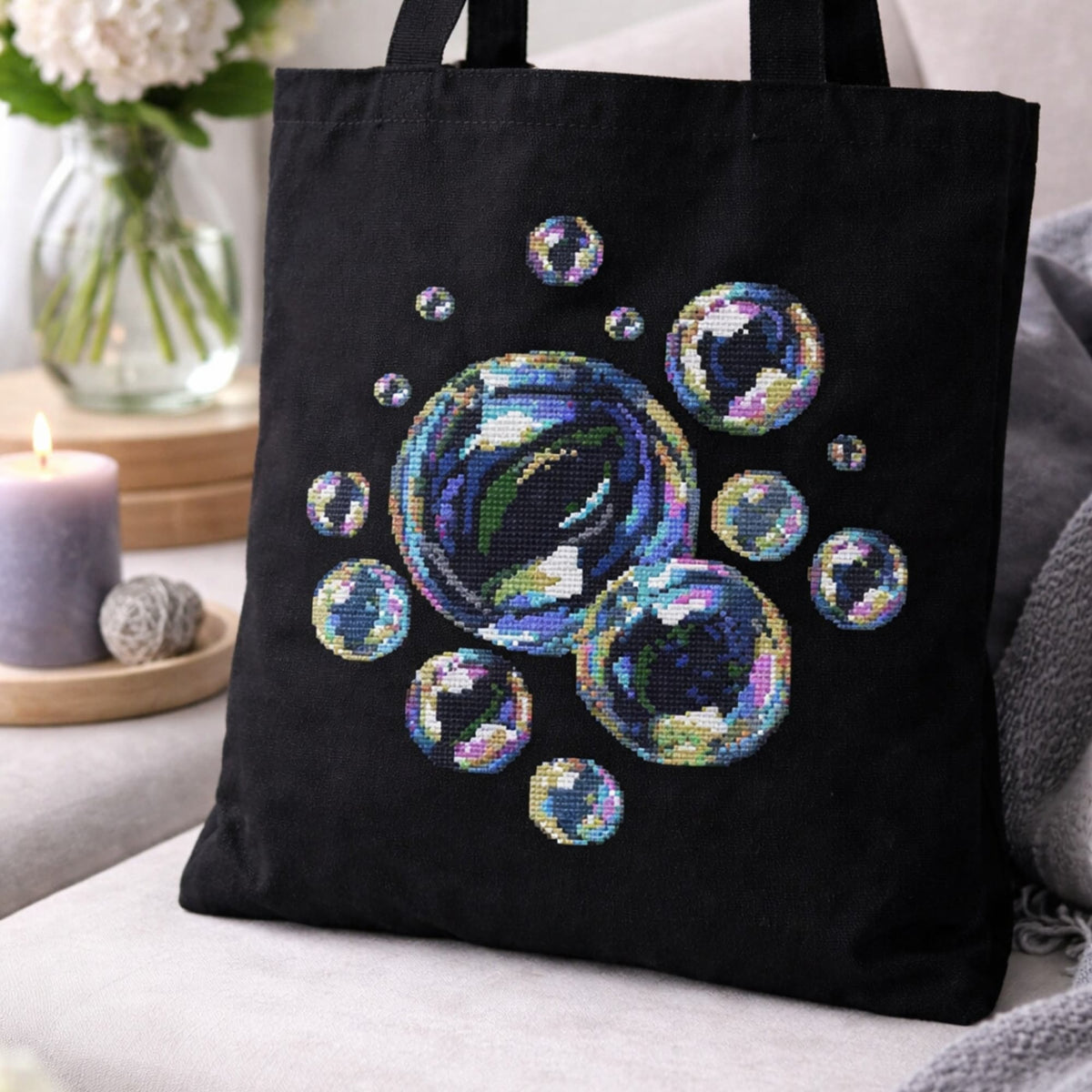 Soap bubbles cross stitch pattern displayed on black tote bag, glossy bubble embroidery design, modern counted cross stitch PDF