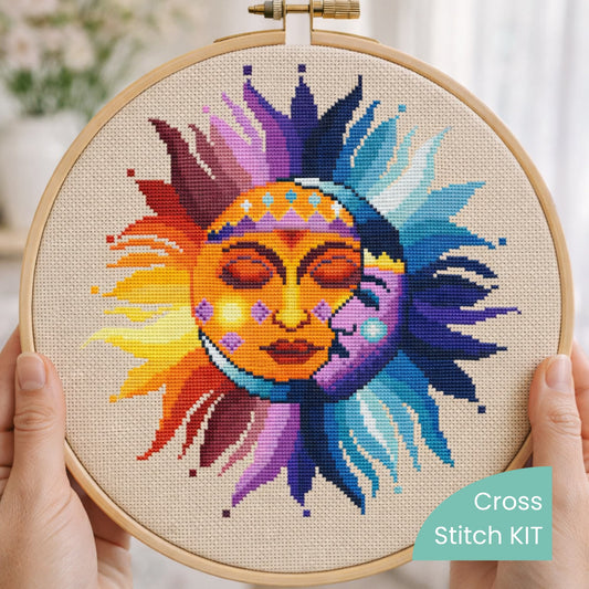 Sun and moon cross stitch kit finished design in embroidery hoop on beige Aida fabric, vibrant celestial sun moon DIY kit